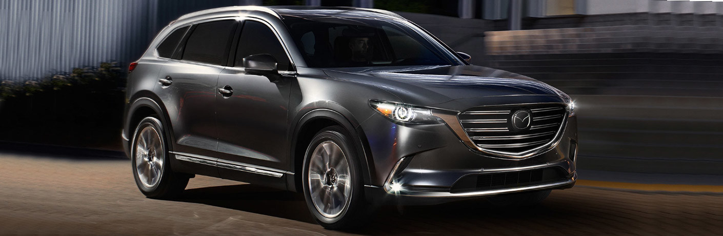 The 2018 Mazda CX-9 is compared to the Kia Sorento and Acura MDX on the website for Hall Mazda.