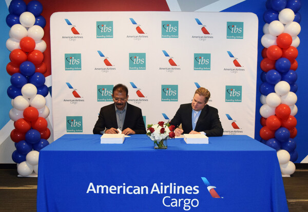 V K Mathews, Executive Chairman, IBS Group and Rick Elieson, President, American Airlines Cargo signing the deal