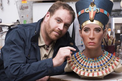 Host of ‘Expedition Unknown,’ Josh Gates examines the sculpture of the “Younger Lady” mummy in the Paris studio of paleoartist Elisabeth Daynès.