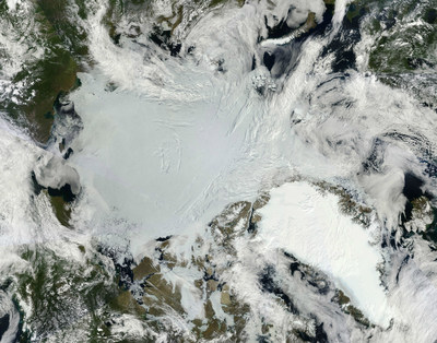 A pair of CubeSat satellites will probe a little-studied portion of the radiant energy emitted by the complex Arctic environment for clues to why the region is warming faster than the rest of the planet. This 2011 composite satellite image shows the expanse of Arctic sea ice (center) and the Greenland Ice Sheet (lower right). Credit: NASA