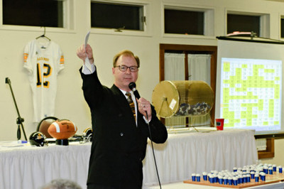 Mr. Froelich in action at a fundraiser event.