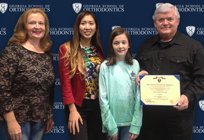 Purple Heart Smiles recipient Ericka White with (left to right) mother Donna White, GSO resident Doctor Jennifer Dang and father Lt. Col. (ret.) Rick White