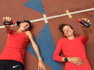 Training partners and elite marathon runners, Shalane Flanagan (left) and Amy Cragg, use HOTSHOT to combat muscle pain, cramping and soreness. www.teamhotshot.com