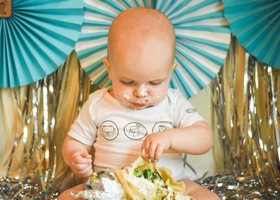 The Burrito Baby | Sarah, Mark, Caleb & Jake | “My husband knew early on of my love for Chipotle. Countless dates there, through dating and marriage. Then during my second pregnancy it was ALL I craved. He knows my order by heart, which is obviously the mark of true love. When our son celebrated his first birthday we HAD to have a Chipotle smash instead of a cake smash! Complete with the best onesie from the website. Our little burrito babe!”