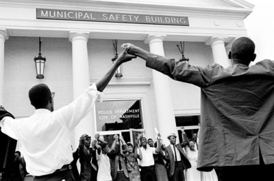 Demonstrators sang in front of the Nashville Police Department on August 7, 1961, protesting what they called police brutality in a racial clash two nights earlier. They criticized 