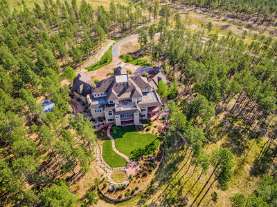 Situated on a private, 45-acre parcel in Colorado Springs, this luxurious mountain home will be sold Without Reserve at a live auction on March 3, 2018. The Colorado estate - which offers direct views of Pikes Peak - was previously asking $4.25 million. Luxury real estate auction firm Platinum Luxury Auctions is managing the sale. More information is available at COLuxuryAuction.com.