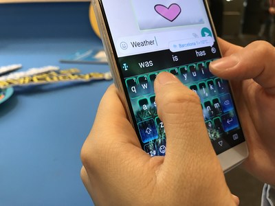 Attendees test out TouchPal AI Keyboard