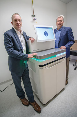 Left to right:Todd Castoe, UTA biology professor and associate director of the Center and Jon Weidanz, UTA associate vice president for research and interim director of the new center, with one of the NovaSeq6000 gene sequencing systems