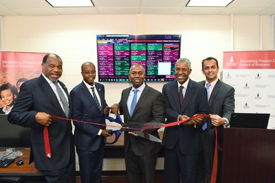 Howard University School of Business (HUSB) unveiled its new Bloomberg Finance Lab, made possible through a generous $250,000 gift from alumnus Wendell E. Mackey, CFA. Pictured L to R: HUSB Dean Barron Harvey; President Wayne A. I. Frederick; Wendell Mackey, CFA; HU Trustee Norman Jenkins; and Bloomberg Representative Paras Doshi.