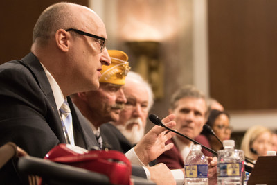Paralyzed Veterans' National President, David Zurfluh (foreground), delivering the organization's annual testimony before the House and Senate Committees on Veterans' Affairs