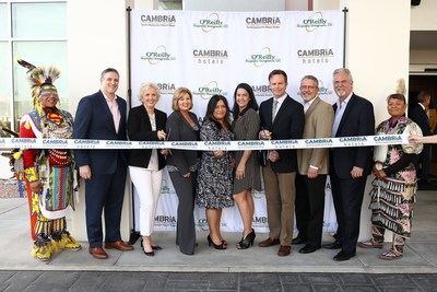 Executives from Choice Hotels and O'Reilly Hospitality Management celebrate the grand opening of the Cambria Hotel North Scottsdale Desert Ridge with a ribbon cutting ceremony.