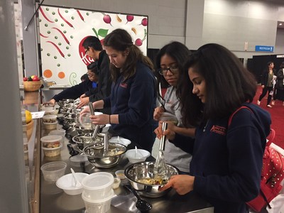Students at SXSW EDU cooking up change by making Aztec Quinoa Grain Bowls at Elly, Chartwells K12’s Mobile Teaching Kitchen.
