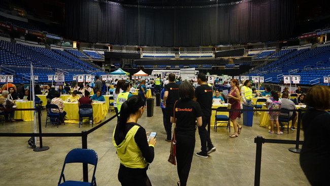 Puerto Rico residents receive free influenza vaccinations Saturday, March 10, at the 18,500-person capacity Jose Miguel Agrelot Coliseum in San Juan. The immunization drive is part of an island-wide campaign that includes more than 50 vaccination centers, pharmacies, hospitals and primary health centers in 36 district across throughout Puerto Rico.