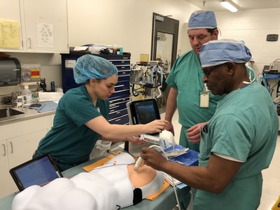 Dr. Keren Aviva Bashan-Gilzenrat (left) and Dr. Bryan Morse (center) demonstrate technical aspects of REBOA during the first GREAT class in December 2017.