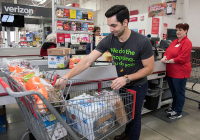 An Instacart employee checks out at BJ’s Wholesale Club in Waltham, Mass. on March 13, 2018 for same-day delivery to BJ’s members as part of the companies’ expanded partnership. (BJ’s Wholesale Club/Christine Hochkeppel)