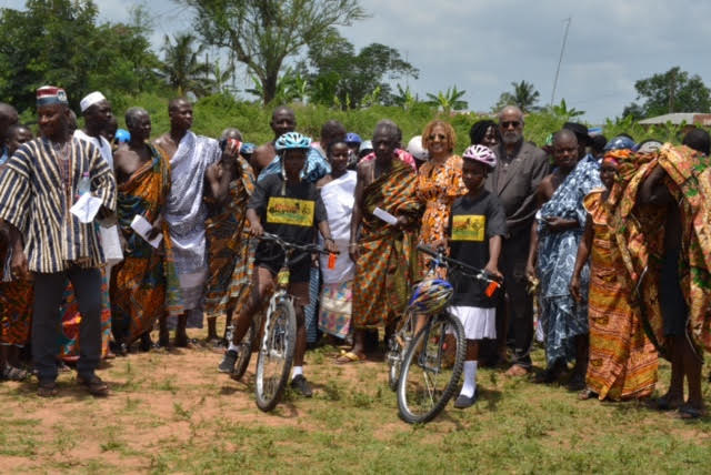 ABCF Board Chair A.Bruce Crawley(fourth from right) and Executive Director Patricia Marshall Harris(sixth from right) join Ashanti chiefs, and other guests, as they recently celebrated the students who received free bamboo bikes made by the Ghana Bamboo Bikes Initiative, in Ejisu, Ashanti Region, Ghana.