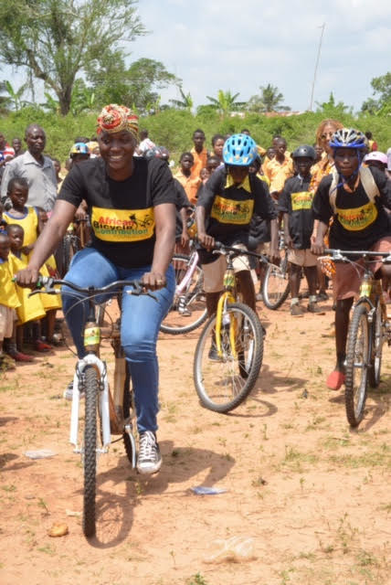 Ghana Bamboo Bikes Initiative CEO Bernice Dapaah(left) recently showed two students how bike riding is actually done in Ejisu, Ghana.