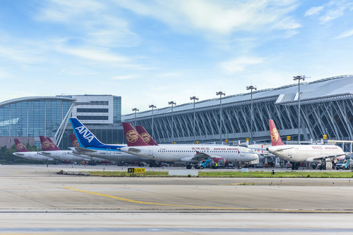 Juneyao Airlines Airbus A320 and ANA Boeing 767 at Terminal 2, Shanghai Pudong International Airport