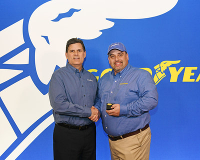 Frank Vieira (right, with Gary Medalis, marketing director, commercial tire, Goodyear) is the 35th recipient of The Goodyear Tire & Rubber Company's Highway Hero Award.