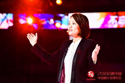 Joey Wat, CEO of Yum China, speaks at the Convention (PRNewsfoto/Yum China Holdings, Inc)