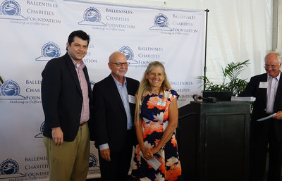 BallenIsles Charities Foundation sets another fundraising record – awarding more than Half-a-Million Dollars in Financial Grants to local charities.   Pictured: Alzheimers Community Cares-Jonathan Price, VP Grants, Dianne Bruce, Director of Grants with BICF President Mark Freeman (center). Bob Anton, Chair of the BICF Grants Committee stands at Podium. The BallenIsles Charities Foundation Grant provides funding for Alzheimers Community Cares Family Nurse Program.