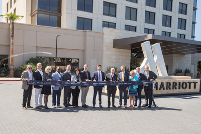 Grand Opening celebrations at the Marriott Irvine Spectrum with J.W. Marriott Jr., Chairman of the Board of Marriott International, Chris Harrison, General Manager of the Marriott Irvine Spectrum, Robert Olson, President and CEO of RD Olson Development, and other executives in Irvine, Calif., on March 27, 2018. (Jeff Lewis/ AP Images for Marriott Hotels)