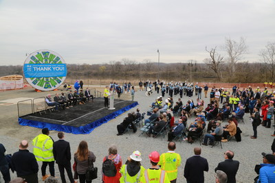 Today DC Water and the District celebrate a cleaner Anacostia River (in the background).