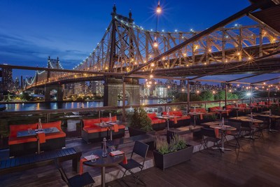 The Manhattan views from Penthouse 808, a stylish indoor-outdoor rooftop bar and lounge at Ravel Hotel, A Trademark Hotel Collection, in Long Island City, N.Y.