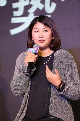 Mrs. Zhi, Founder & CEO of DaDaABC, giving speech