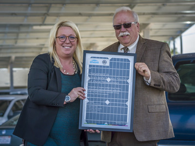 ENGIE Services U.S. Vice President Courtney Jenkins and Escalon Unified School District Superintendent Ron Costa commemorate the beginning of Escalon Unified's new, comprehensive clean energy program with ENGIE.