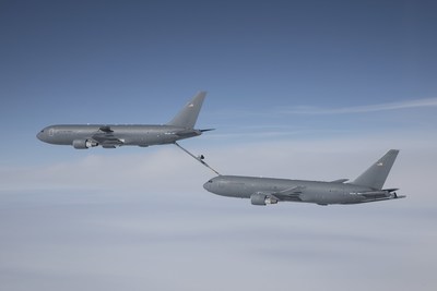 A Boeing KC-46 tanker refuels a second KC-46, transferring 146,000 pounds of fuel as part of its “on-load” certification testing. The KC-46’s refueling boom allows it to transfer up to 1,200 gallons of fuel per minute.