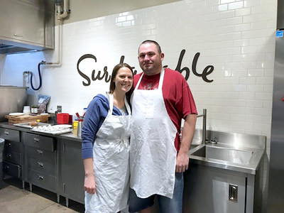 Warrior Alan Cowden, his wife Holly, and other injured veterans picked up cooking tips from trained culinary professionals during a recent cooking class with Wounded Warrior Project® (WWP).