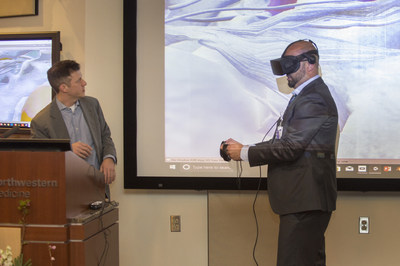 Neurosurgeons Dr. Michael Walsh (left) and Dr. Osaama Khan (right) demonstrate how virtual reality can be used to plan for surgery during the Northwestern Medicine Innovation Grant Challenge Final Event. The surgeons and their team won $50,000 to develop a project aimed at enhancing patient engagement through use of advanced video platforms.