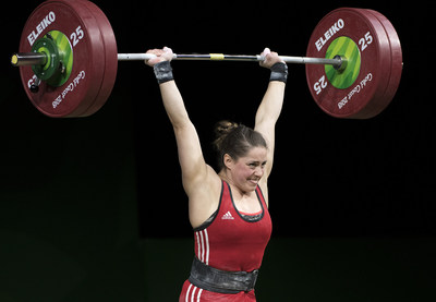 Maude Charron of Rimouski, Qc captures the gold medal in Weightlifting, 63kg, breaking the Commonwealth Games record with a lift of 122kg. (CNW Group/Commonwealth Games Association of Canada)