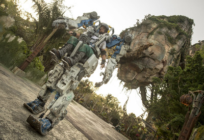 Pandora Utility Suit Debuts at Disney's Animal Kingdom- A towering mechanical suit is sure to stop Walt Disney World Resort guests in their tracks when it debuts April 22 at Pandora - The World of Avatar at Disney's Animal Kingdom in Lake Buena Vista Fla. The new Pandora Utility Suit is inspired by the iconic Amplified Mobility Platform (AMP) suits of power armor from the epic film, "AVATAR." Perched ten feet high, a human pilot straps into the cockpit of this exo-carrier and controls its powerful, yet agile movements. Designed for restoration, this suit will traverse the land daily while its pilot interacts with guests, sharing details about the land's otherworldly landscape and highlighting the importance of preserving nature. (Kent Phillips, photographer)