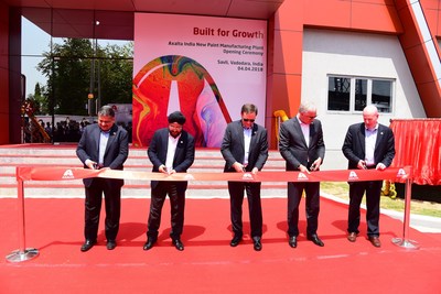 From left: Axalta Executives Vinay Rajadhyaksha, Sobers Sethi, Charles Shaver, Steven Markevich, and Dan Key cut ribbon at plant opening ceremony in Savli, India.