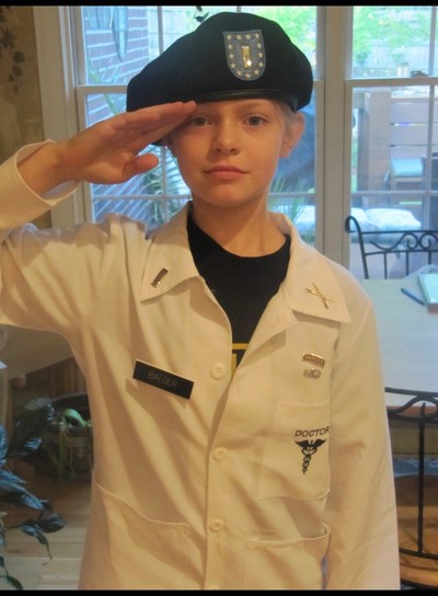 In a picture taken for her 5th grade "Career Day" Baeder wore her father's beret, ranger t-shirt and a lab coat decorated with her father's military insignia. "In joining the Long Gray Line, I am honored to continue the military legacy of my father, grandfathers and great-grandfathers, who all served in the military," says Baeder, who is the reigning Miss America's Outstanding Teen. She will attend the U.S. Military Academy at West Point this fall for military leadership training.