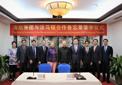 Representatives from HNA and Temasek met at the Boao Forum for the signing of the agreement