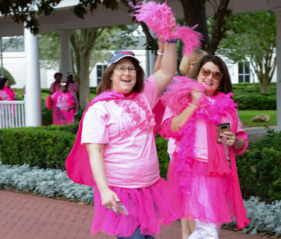 Avon Representatives show their pink pride as they walk to celebrate Avon’s announcement of their sponsorship of the American Cancer Society’s Making Strides Against Breast Cancer Walks.