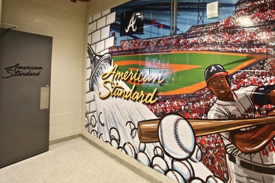 SunTrust Park in Atlanta, Georgia, celebrates a new partnership between the Atlanta Braves and American Standard with the bold hallway murals that blend views of the building with the brand’s popular plumbing fixtures.