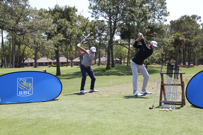 Johnson and Saunders both take swings using old Arnold Palmer branded clubs and balls (CNW Group/RBC)