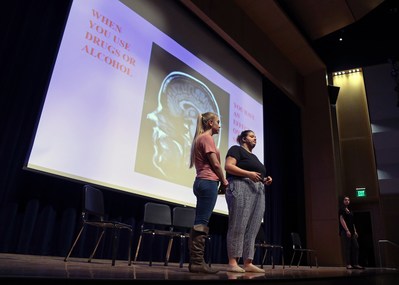 Drug Story Theater cast members Heather and Emily speak to Quincy middle school students on the science behind addiction (PRNewsfoto/Blue Cross Blue Shield MA)