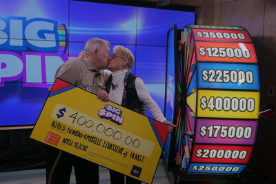 Alfred Konrad and Mirelle Levasseur of Hearst celebrate after spinning THE BIG SPIN Wheel at the OLG Prize Centre in Toronto to win $400,000. The couple won a top prize with OLG’s INSTANT game – THE BIG SPIN. (CNW Group/OLG Winners)