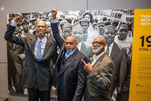 Dr. Tommie Smith (center) and Dr. John Carlos (right) both accepted Newseum Free Expression Awards for their protest on the medal podium at the 1968 Summer Olympics. Before the award ceremony they posed in front of the Newseum's "1968: Civil Rights at 50" exhibit, which includes the famous photo that captured their protest. Kareem Abdul-Jabbar (left), retired professional basketball player for the Milwaukee Bucks and the Los Angeles Lakers presented the award. Credit: Kea Dupree Photography