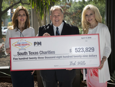 Bob Wills, center, founder and CEO of The PM Group, wife Peggy Wills, left, and Fran Yanity, right, president and COO of The PM Group, pose during a press conference held to award more than five hundred thousand dollars in donations to fourteen area nonprofit organizations, Tuesday, April 17, 2018, in San Antonio. The donations were the result of The PM Group’s annual Kings & Queens of Good Hearts Fun-Raiser gala. (Darren Abate/AP Images for The PM Group)