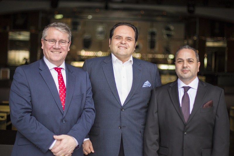 From left to right: David Walsh (CEO, Netwatch Group), Samir Samhouri (Chairman of the Board, Netwatch Group), Woodie Andrawos (Managing Director and President, NMC)