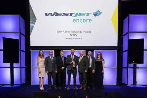 WestJet Encore announced it has been named a winner in the Bombardier Commercial Aircraft's 2017 Airline Reliability Performance awards (left to right: WestJet Encore Reliability Analyst, Ashlee Tanner; WestJet Encore Lead Aircraft Maintenance, Neil Quinn; WestJet Encore Assistant Chief Pilot, Dave Daniel; WestJet Encore Vice-President, Flight Operations, John Aaron; Vice-President and General Manager of Q400 Program and Customer Services for Bombardier Commercial Aircraft, Todd Young; WestJet Encore QA, Jeff MacFarlane; WestJet Encore Reliability Program Manager, Margaret Haswell) (CNW Group/WESTJET, an Alberta Partnership)