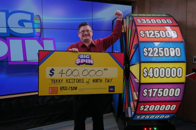 Terry Restoule of North Bay celebrates after spinning THE BIG SPIN Wheel at the OLG Prize Centre in Toronto to win $400,000. Restoule won a top prize with OLG’s INSTANT game – THE BIG SPIN. (CNW Group/OLG Winners)
