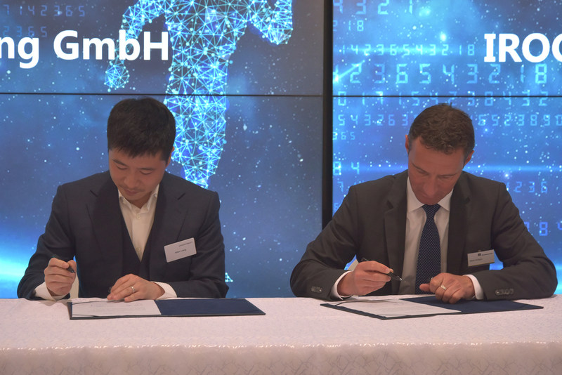 Allen Liang, president of IROOTECH, signed along with Martin Knötgen, CEO of Putzmeister