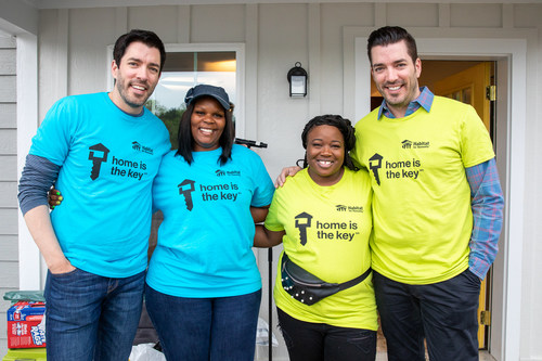Drew and Jonathan Scott with future Habitat homeowners Amanda and Ashlee at the front door of Amanda’s new home in Nashville today. The Scott brothers helped Amanda and Ashlee build their new homes as part of Habitat for Humanity’s national Home is the Key campaign.
